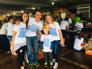 A group of First Business Bank employees volunteering